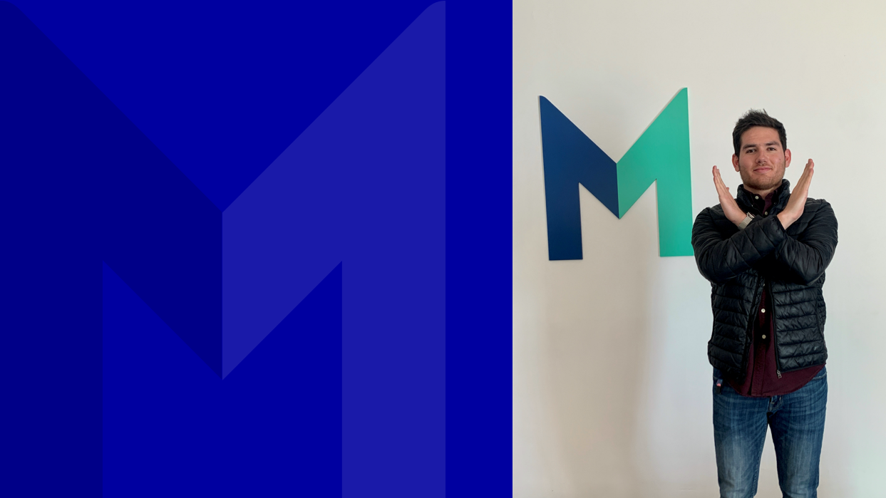 Associate Yoshua with break the bias hand sign