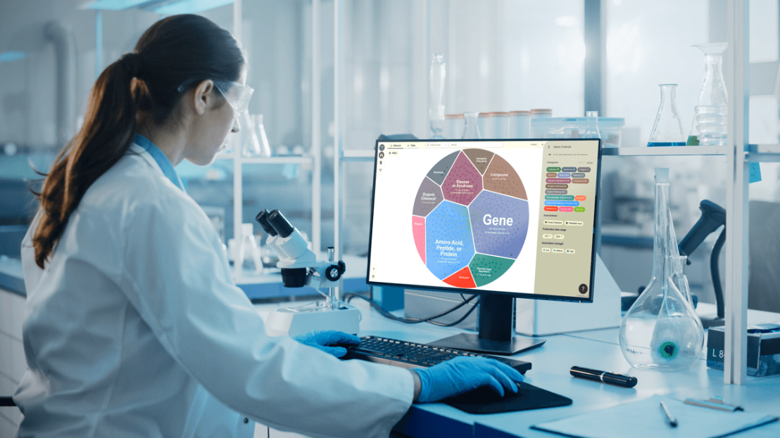 Woman scientist using a computer in a lab