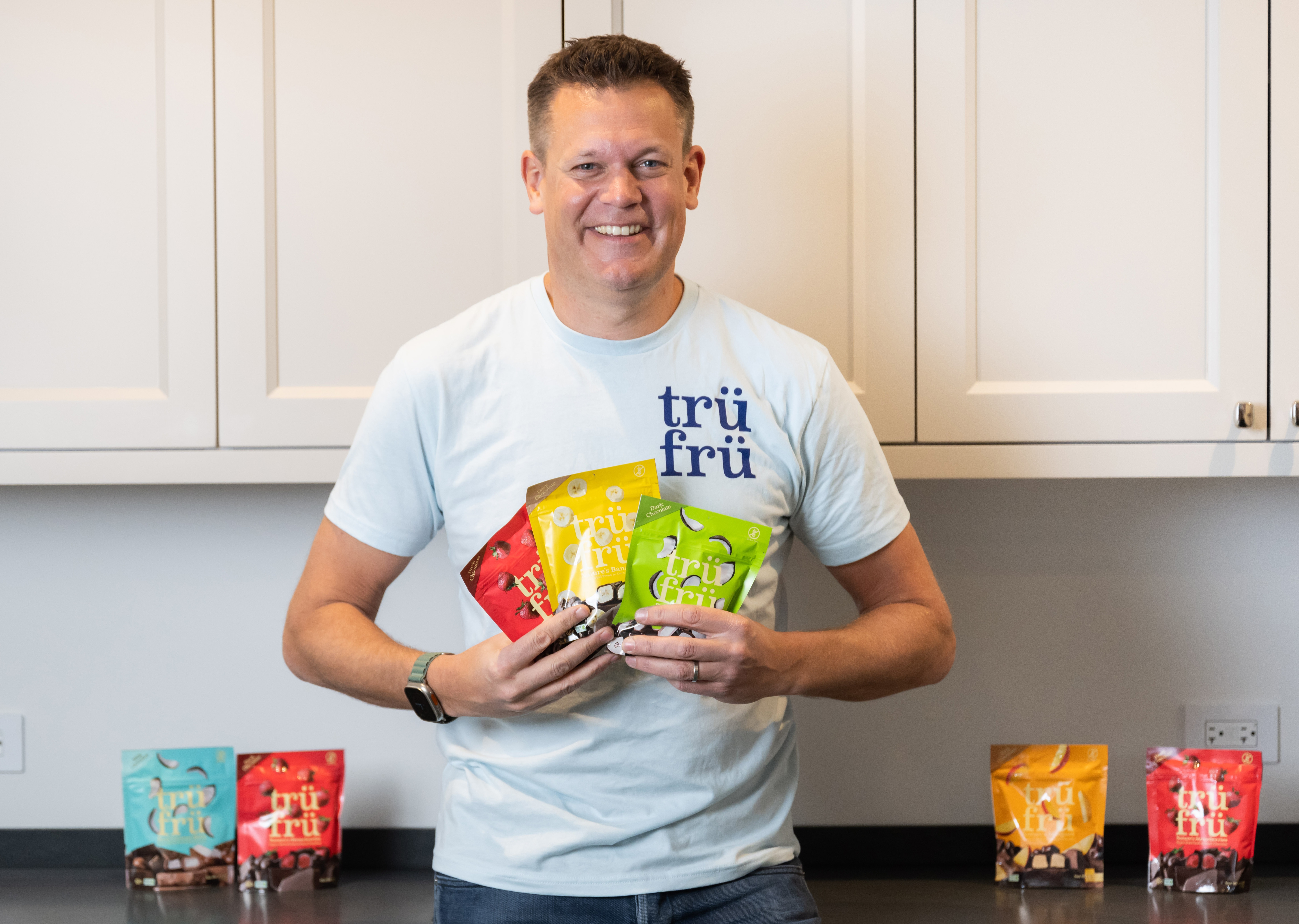 Andrew Clarke with packages of Tru Fru 