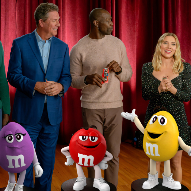 Scarlett Johansson starring alongside Dan Marino, Terrell Owens and Bruce Smith in the 2024 M&M's Super Bowl commercial