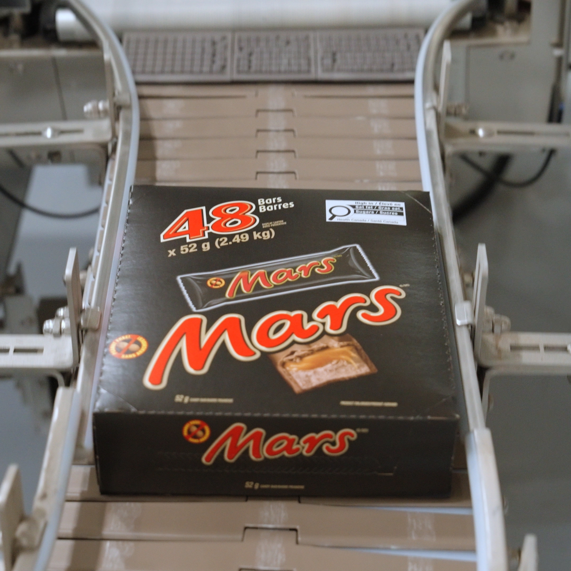 A box of Mars bars in a factory