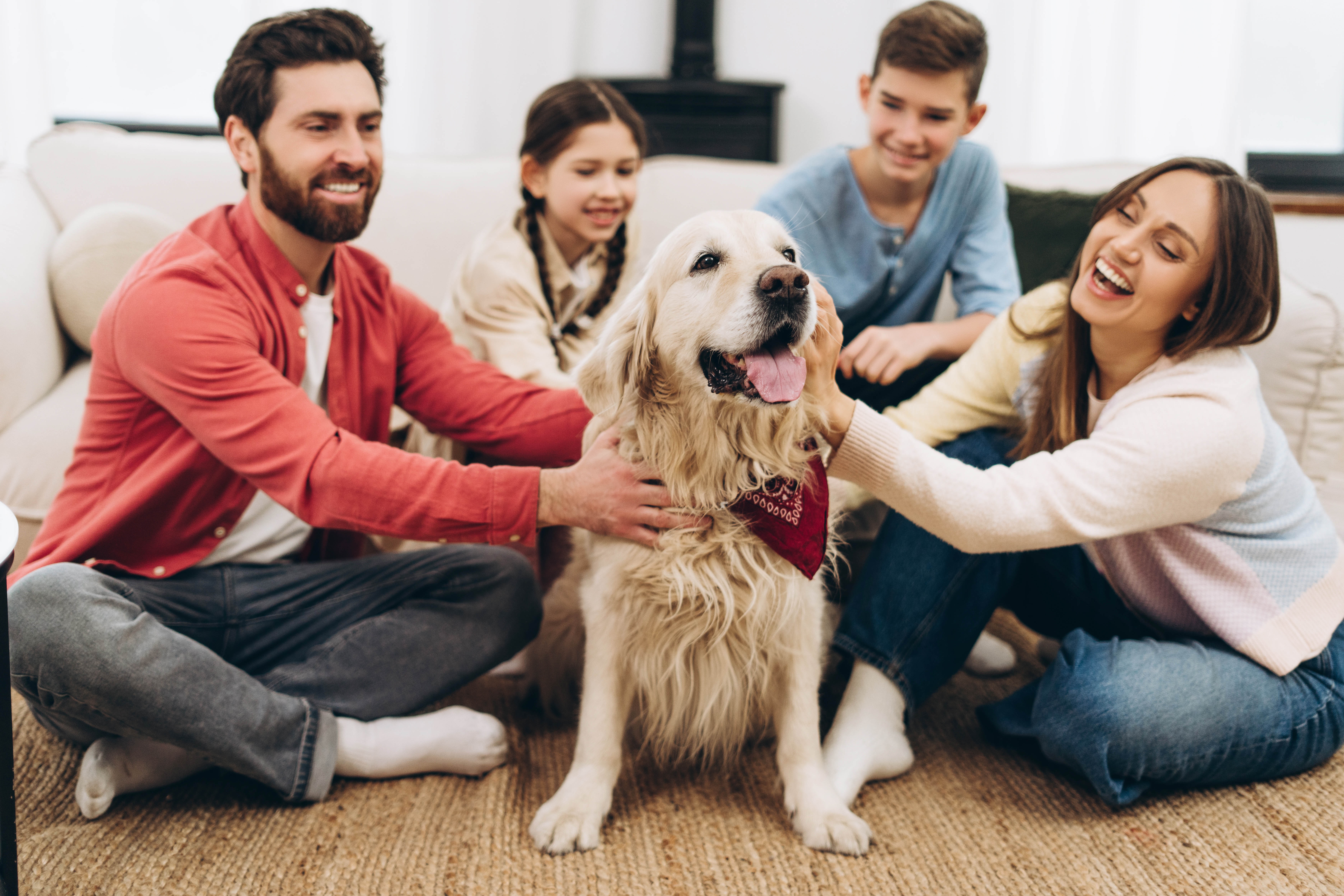 Happy family with a dog 