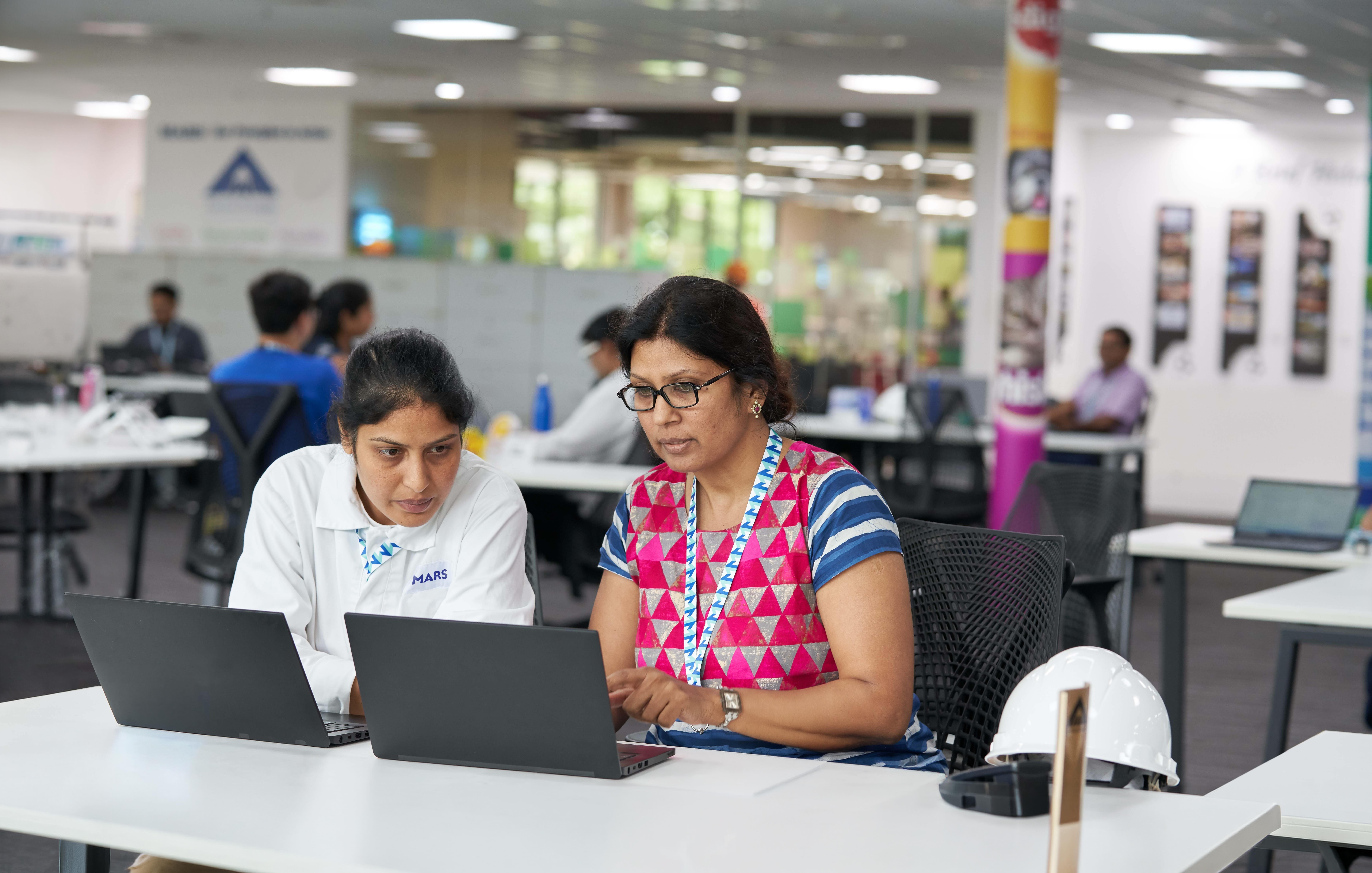 Women in Mars office on laptop