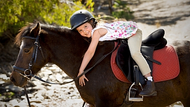 Girl riding horse