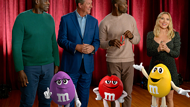Scarlett Johansson starring alongside Dan Marino, Terrell Owens and Bruce Smith in the 2024 M&M's Super Bowl commercial