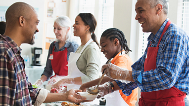 Volunteer serving food
