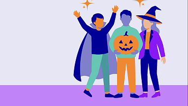 Three people in colorful costumes celebrating Halloween