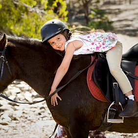 Girl riding horse