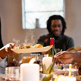 A family enjoying dinner together 