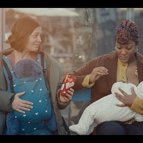 Two new mothers sharing Maltesers™