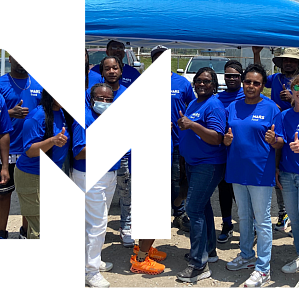 Mars volunteers pose for a photo at a mobile pantry