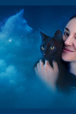 Woman in night sky clouds with black cat